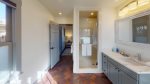 Spacious second en-suite bathroom with walk-in tiled shower
